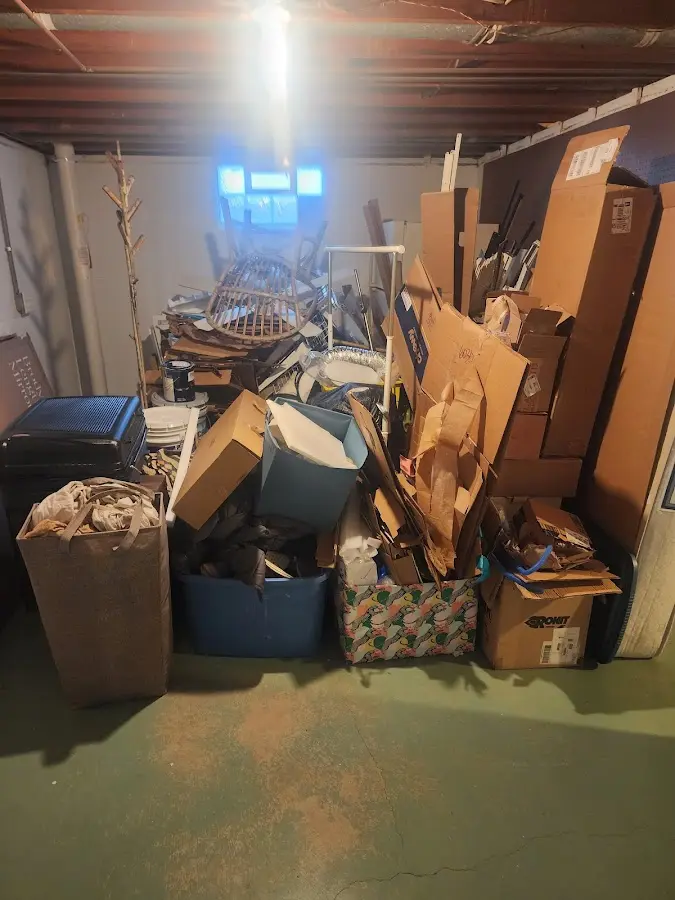 Roll-off dumpster container at job site for 15 Yard Dumpster Rental in Bigfork